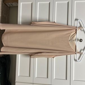 Nude dress with sleeve cutouts